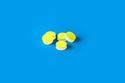 Picture of 17mm (21/32") Diameter Low Bleed Yellow PTFE/Cream Silicone Septa, 3mm Thick, Max Temp 250°C